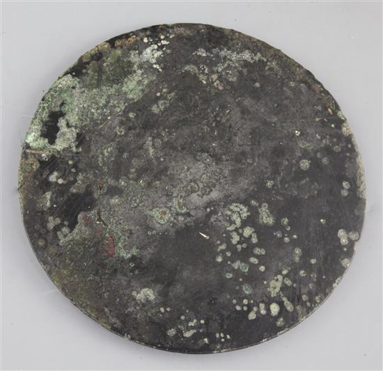 A Chinese bronze circular TLV mirror, Han dynasty, 1st century B.C. 15cm diameter, repaired